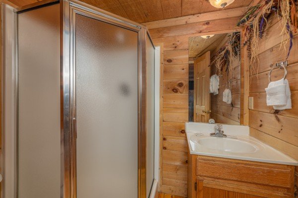 Bathroom with a shower stall at Moonlight in the Boondocks, a 2 bedroom cabin rental located in Gatlinburg
