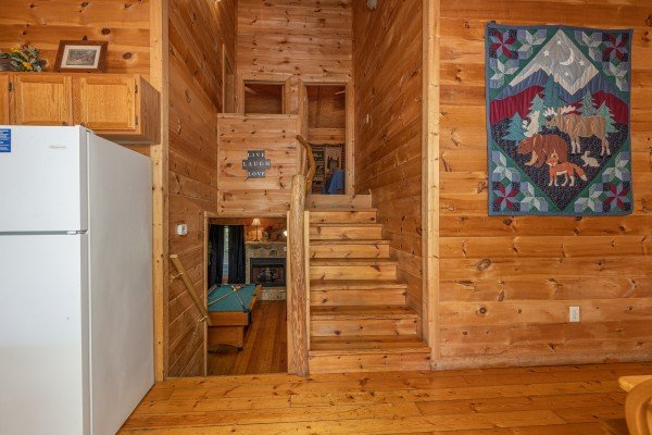 Stairs going up and down at Moonlight in the Boondocks, a 2 bedroom cabin rental located in Gatlinburg