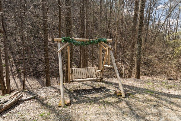 Swing in the yard at My Smoky Mountain Hideaway, a 3 bedroom cabin rental located in Pigeon Forge