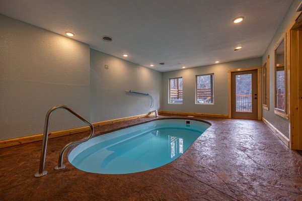 Indoor pool entrance at Swimmin' Hole In 1, a 2 bedroom cabin rental located in Gatlinburg