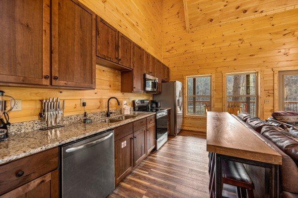 Kitchen with breakfast bar at Swimmin' Hole In 1, a 2 bedroom cabin rental located in Gatlinburg