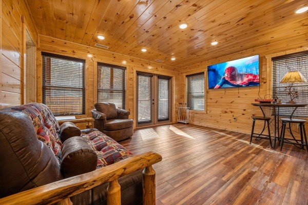 Log furniture and ceiling lighting at Swimmin' Hole In 1, a 2 bedroom cabin rental located in Gatlinburg