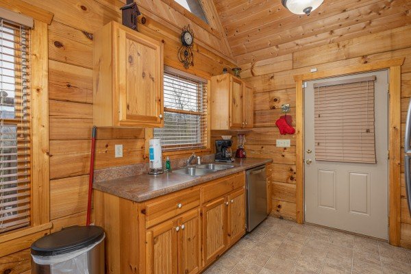 Kitchen with stainless appliances at Alpine Romance, a 2 bedroom cabin rental located in Pigeon Forge