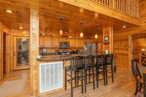 Breakfast bar for four at Rainbow's End, a 4 bedroom cabin rental located in Pigeon Forge