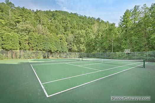 Tennis court at Shagbark; at Breezy Mountain Lodge, an 11-bedroom cabin rental located in Pigeon Forge