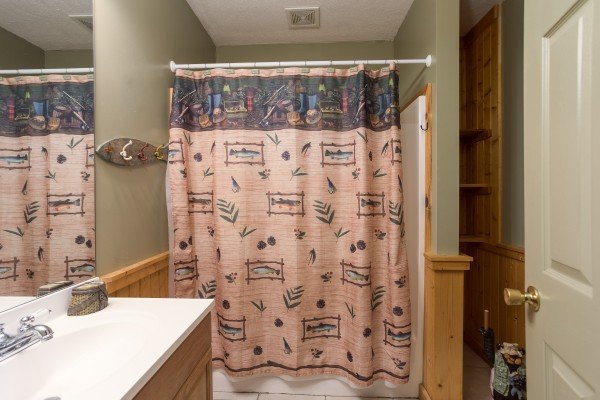 Bathroom at Breezy Mountain Lodge, an 11-bedroom cabin rental located in Pigeon Forge