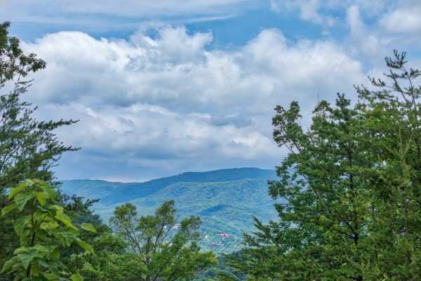 A mountain view at Breezy Mountain Lodge, an 11-bedroom cabin rental located in Pigeon Forge