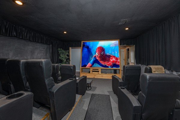 Theater room at Breezy Mountain lodge, a 11 bedroom cabin rental located in Pigeon Forge