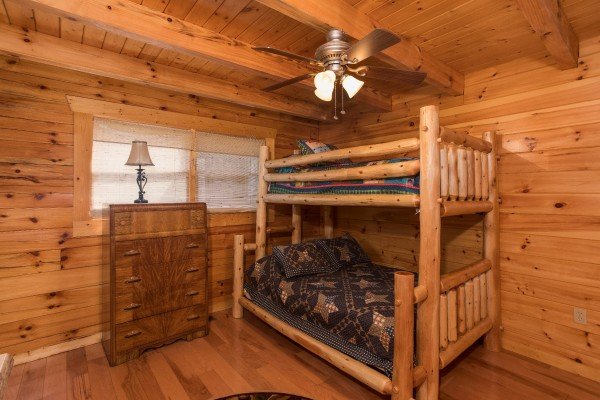 Full and twin bunk next to a dresser at Leconte View Lodge, a 3 bedroom cabin rental located in Pigeon Forge
