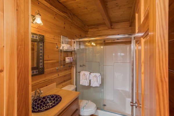 Bathroom with custom vanity and large shower at Leconte View Lodge, a 3 bedroom cabin rental located in Pigeon Forge
