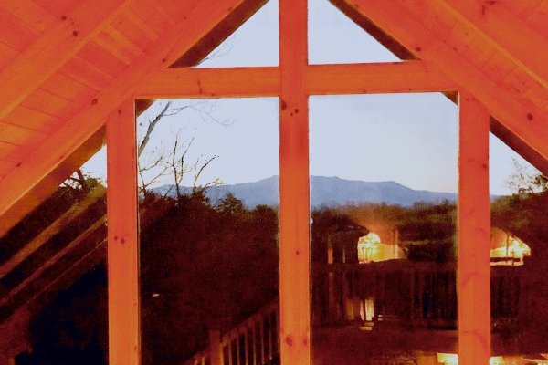Sunset from inside at Leconte View Lodge, a 3 bedroom cabin rental located in Pigeon Forge