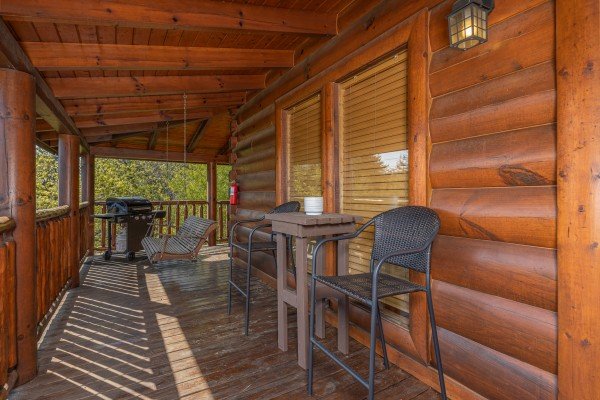 Deck seating at Rocky Top Memories, a 2 bedroom cabin rental located in Pigeon Forge