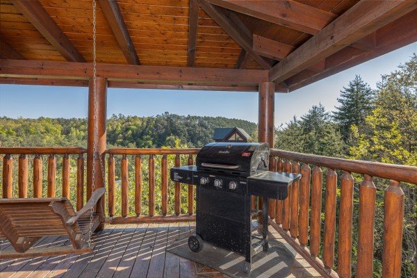 Gas grill on deck at Rocky Top Memories, a 2 bedroom cabin rental located in Pigeon Forge