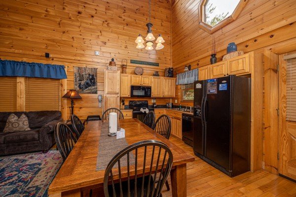 Dining table for 6 at Rocky Top Memories, a 2 bedroom cabin rental located in Pigeon Forge