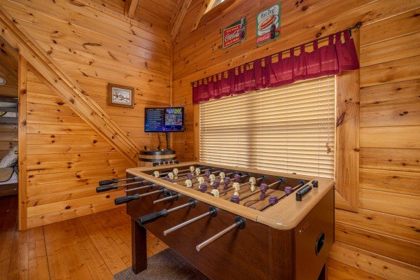 Foosball at Rocky Top Memories, a 2 bedroom cabin rental located in Pigeon Forge