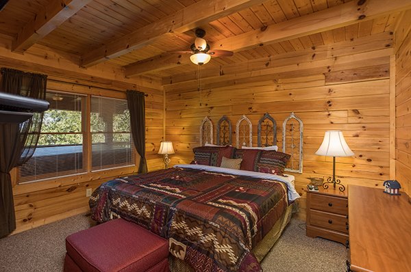 Bedroom with a king bed at Lake Life, a 4 bedroom cabin rental located in Sevierville