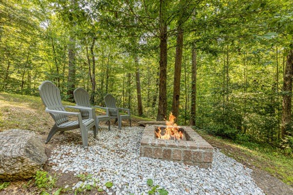 Firepit at Happy Hideaway, a 4 bedroom cabin rental located in Pigeon Forge