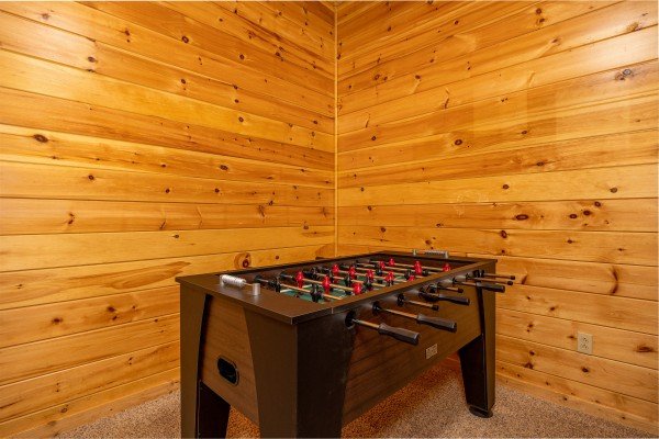 Foosball table at Happy Hideaway, a 4 bedroom cabin rental located in Pigeon Forge