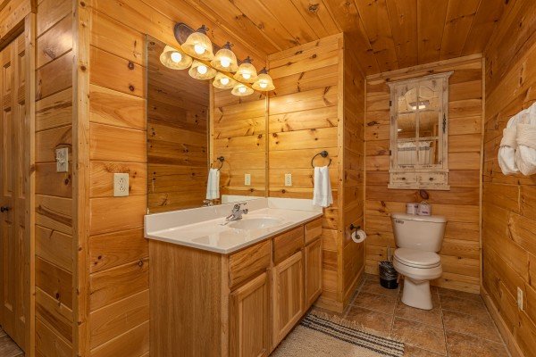 Main Floor bathroom at Happy Hideaway, a 4 bedroom cabin rental located in Pigeon Forge