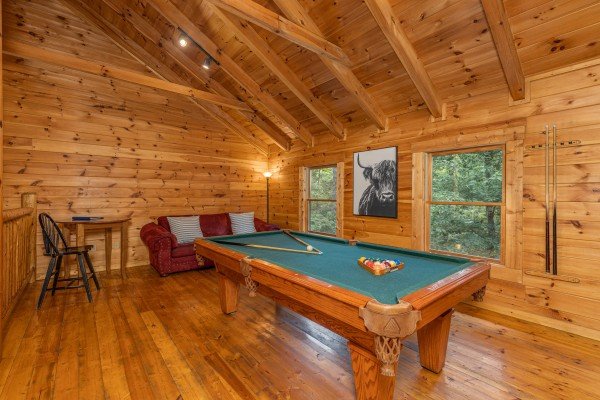 Pool table at Happy Hideaway, a 4 bedroom cabin rental located in Pigeon Forge