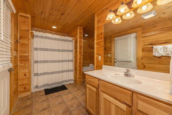 Shower at Happy Hideaway, a 4 bedroom cabin rental located in Pigeon Forge