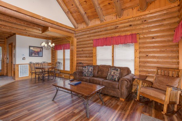Sofa and chair in the living room at Starry Starry Night #725, a 2 bedroom cabin rental located in Pigeon Forge