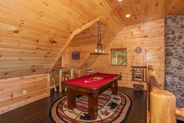 Pool table in the loft space at Panorama, a 2 bedroom cabin rental located in Pigeon Forge