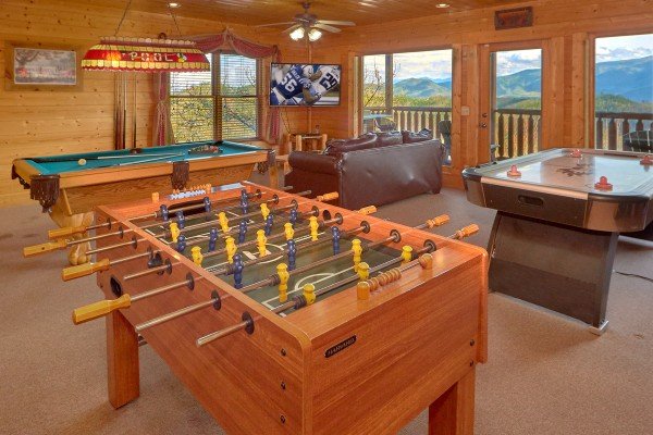Foosball table in game room at Million Dollar View, a 2 bedroom cabin rental located in Pigeon Forge