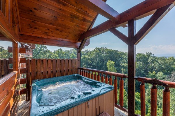 Hot tub on the loft deck at 1 Above the Smokies, a 2 bedroom cabin rental located in Pigeon Forge