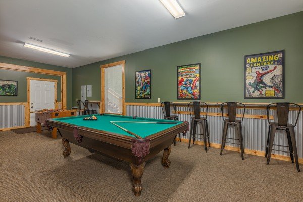 Pool table in the game room at Smokies Paradise Lodge, a 5 bedroom cabin rental located in Pigeon Forge