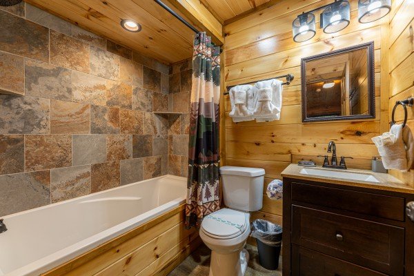 Bathroom with shower and tub combo at 2 Crazy Cubs, a 2 bedroom cabin rental located in Pigeon Forge
