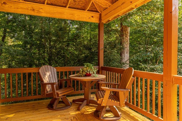 Deck table for two at 2 Crazy Cubs, a 2 bedroom cabin rental located in Pigeon Forge