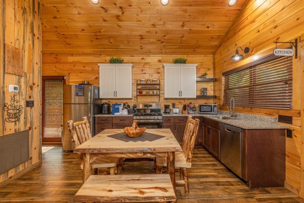 Eat-in kitchen dining table at 2 Crazy Cubs, a 2 bedroom cabin rental located in Pigeon Forge
