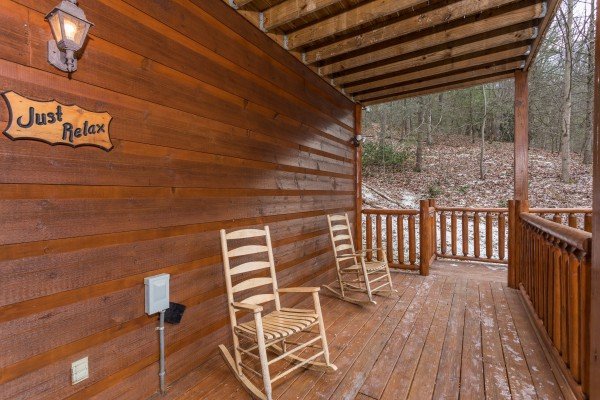 Front porch with rocking chairs at Just Relax, a 2 bedroom cabin rental located in Pigeon Forge