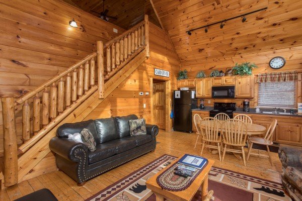 Sofa in a living room at Just Relax, a 2 bedroom cabin rental located in Pigeon Forge