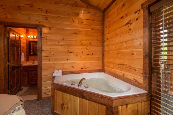 Jacuzzi in a bedroom at Tennessee Treasure, a 3 bedroom cabin rental located in Pigeon Forge
