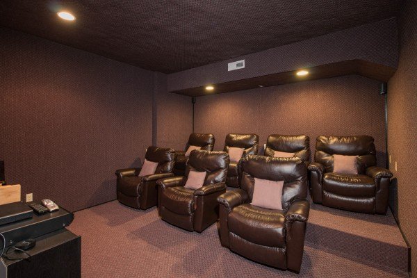Seating in the home theater at Tennessee Treasure, a 3 bedroom cabin rental located in Pigeon Forge