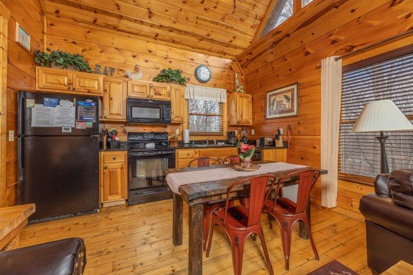 Dining table for 4 at Dragonfly, a 2 bedroom cabin rental located in Gatlinburg