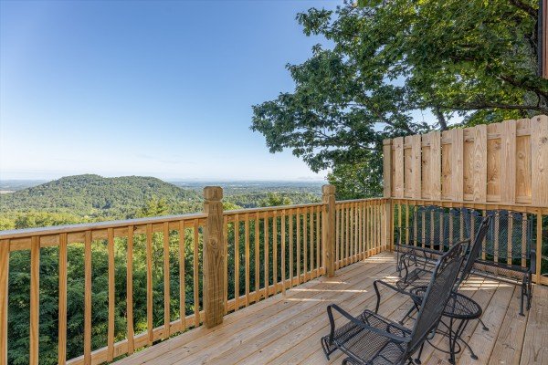 Deck seating with a view at Cozy Mountain View, a 1 bedroom cabin rental located in Pigeon Forge