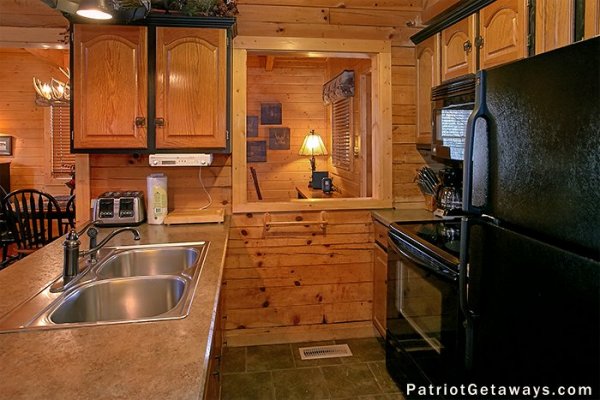 Close up of the kitchen at Stags Leap, a 2 bedroom cabin rental located in Pigeon Forge
