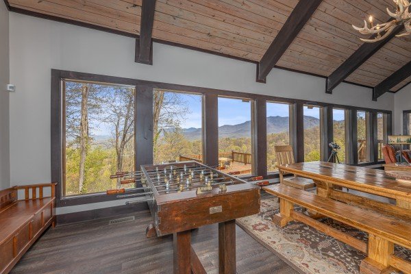 Foosball in the dining room at Ober the Top Views, a 3 bedroom cabin rental located in Gatlinburg