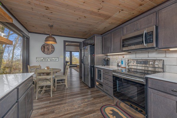 Kitchen with stainless appliances at Ober the Top Views, a 3 bedroom cabin rental located in Gatlinburg