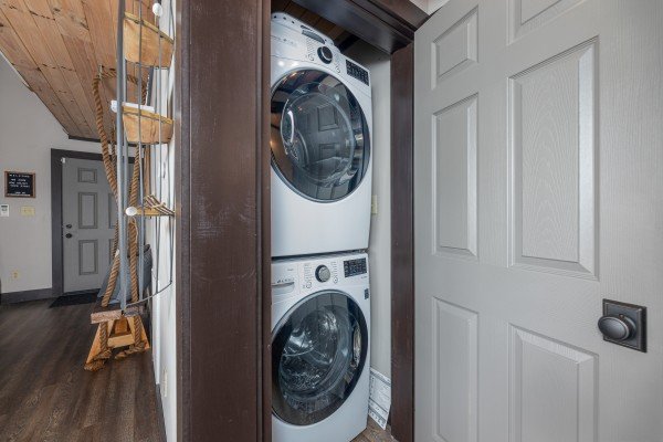 Stacked washer and dryer at Ober the Top Views, a 3 bedroom cabin rental located in Gatlinburg