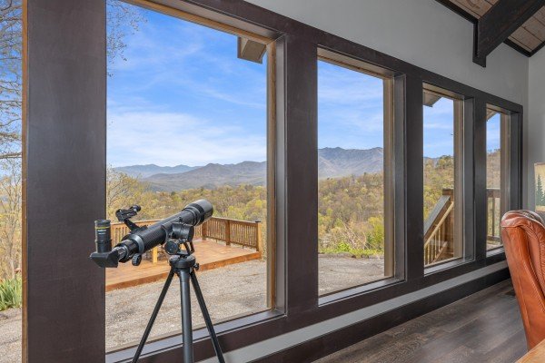 Telescope looking at the view at Ober the Top Views, a 3 bedroom cabin rental located in Gatlinburg