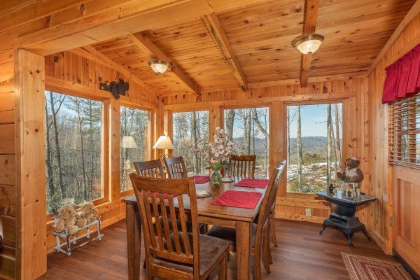 Dining space for 6 at Bearfoot Adventure, a 2 bedroom cabin located in Gatlinburg