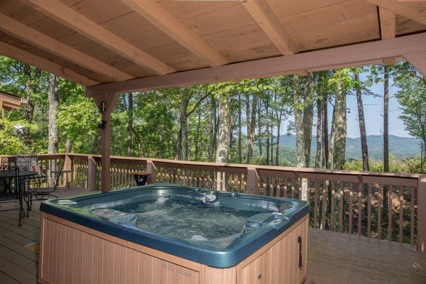 Mountain views from the hot tub at bearfoot adventure a 2 bedroom cabin rental located in gatlinburg