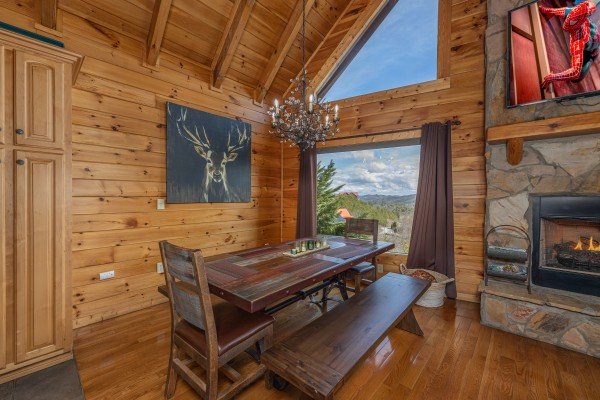 Dining table for eight at Mountain Mama, a 3 bedroom cabin rental located in Pigeon Forge