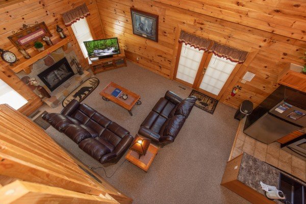 Looking down at the living room at Momma Bear, a 2 bedroom cabin rental located in Pigeon Forge