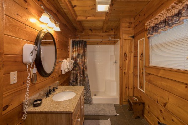 bathroom with walk in shower at always & forever a 1 bedroom cabin rental located in pigeon forge