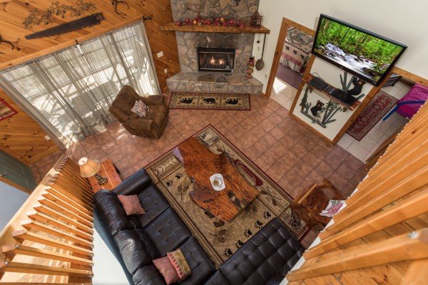 Looking down at the living room at Alone at the Top, a 3 bedroom cabin rental located in Pigeon Forge